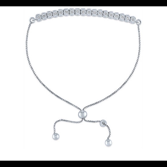 Jewelry - 1/10 CT. T.W. Genuine Diamond Sterling Silver